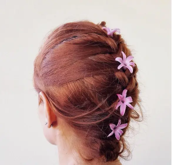 Braids Straight Back With Flowers Hairstyle
