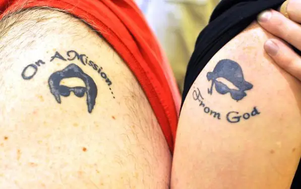 Incomplete Quotes Matching Tattoo Design On Arms