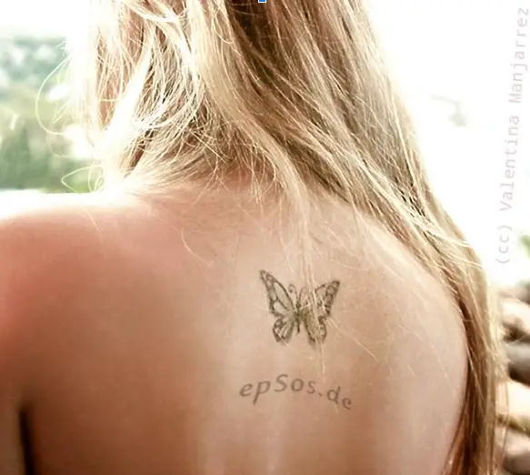 Minimal Butterfly Neck Tattoo For Women