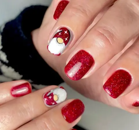 Gonk with Sparkly Red Christmas Nails